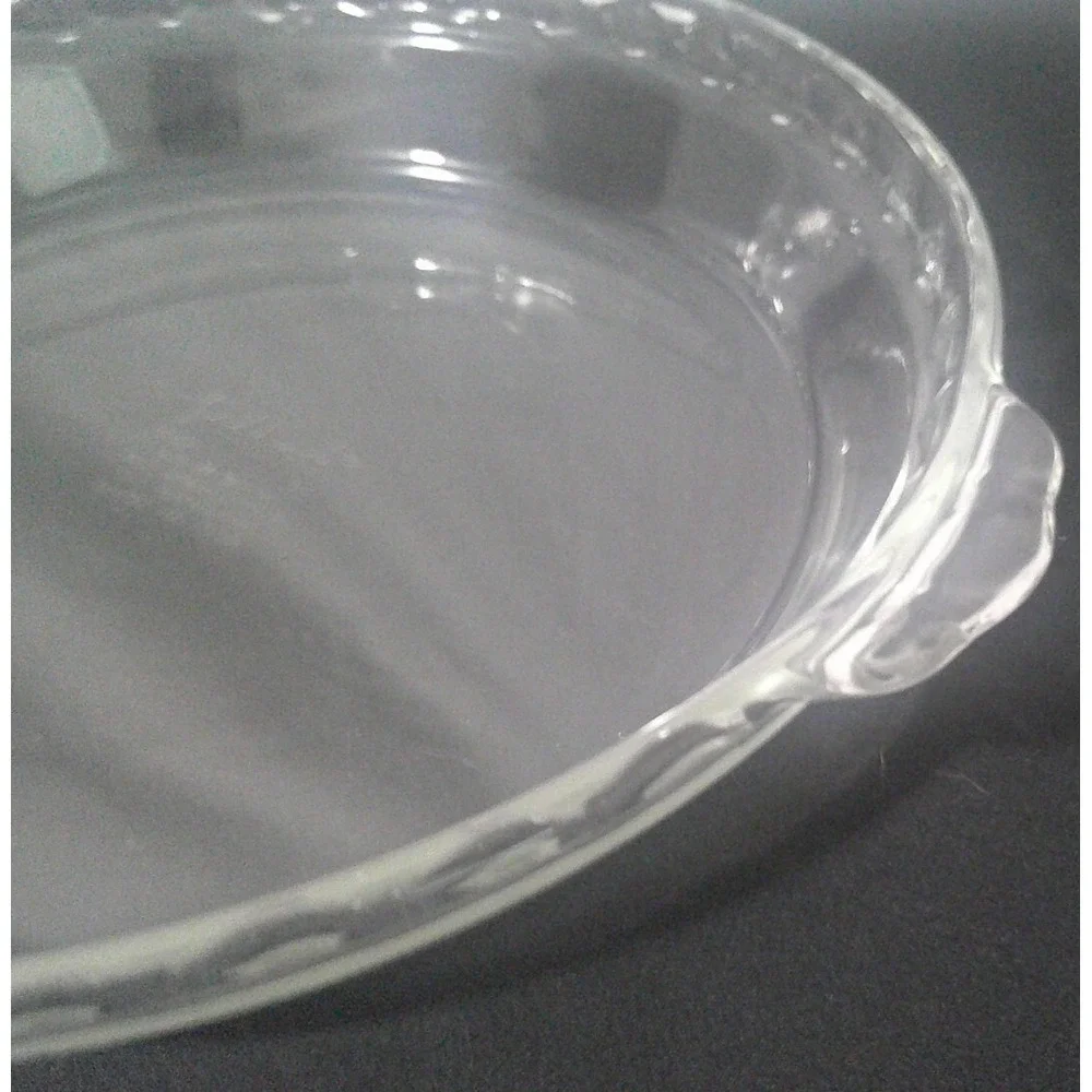 Pyrex 229 9.5-inch clear glass pie dish in good condition